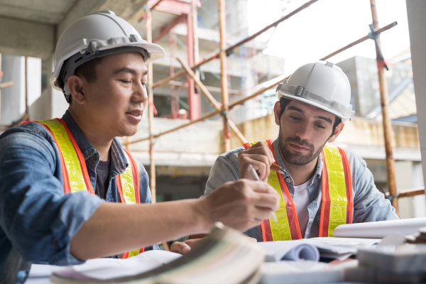 workers going over safety manual